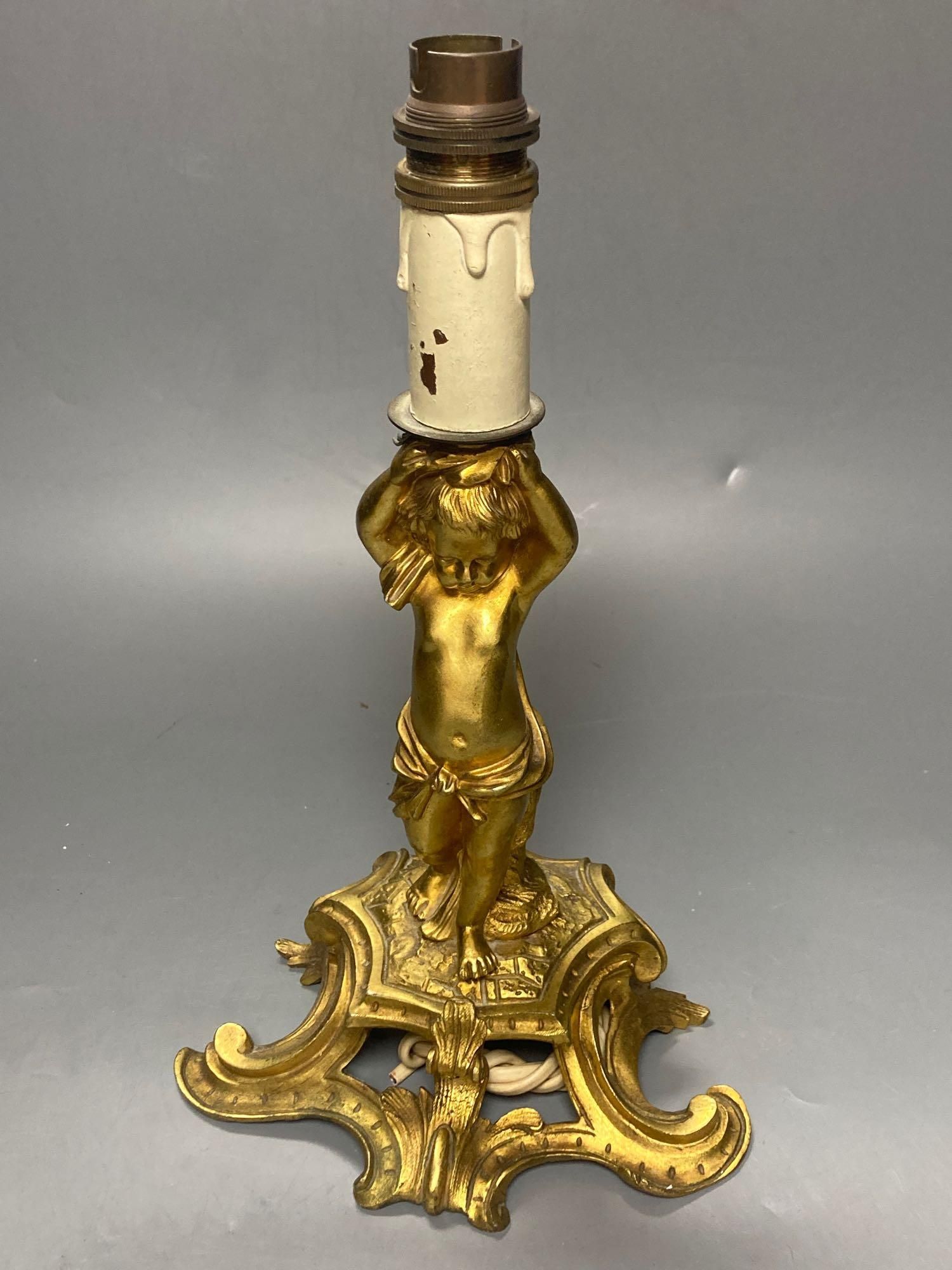 A 19th century ormolu figural lamp stem, 21cm excluding light fitting